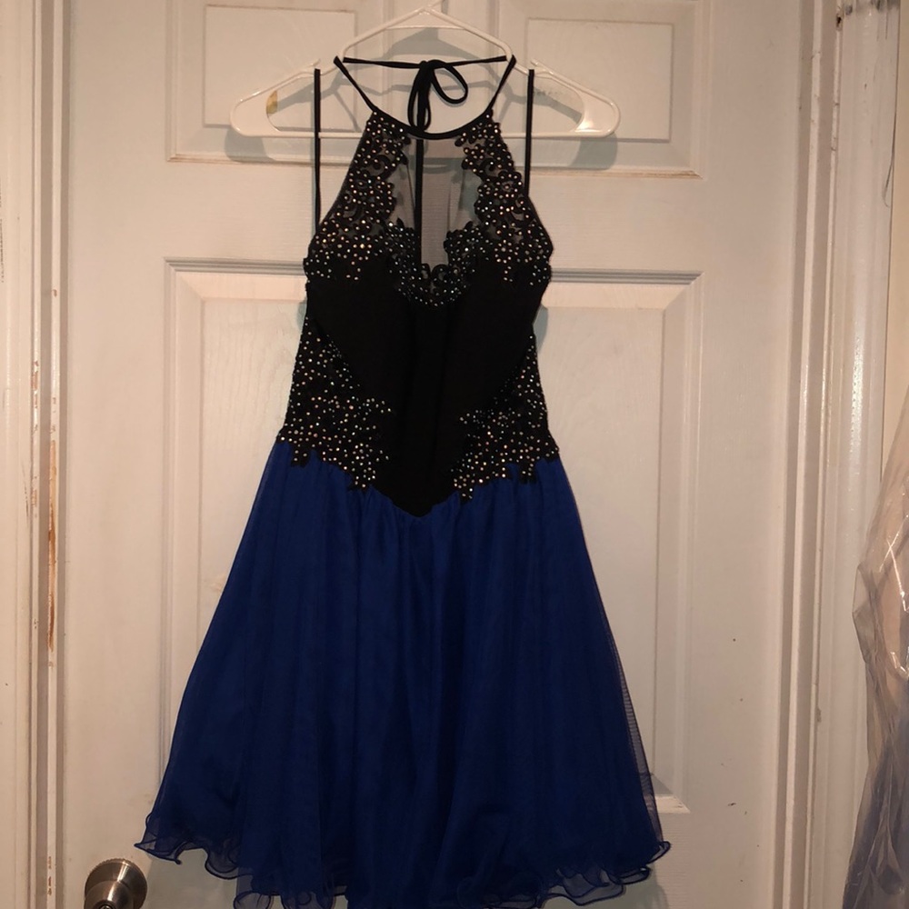 Size 9  Blondie Nites dress by Stacy Sklar